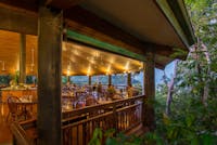 Restaurant high in the trees looking out to Snapper Island and Low Isles on the Coral Sea