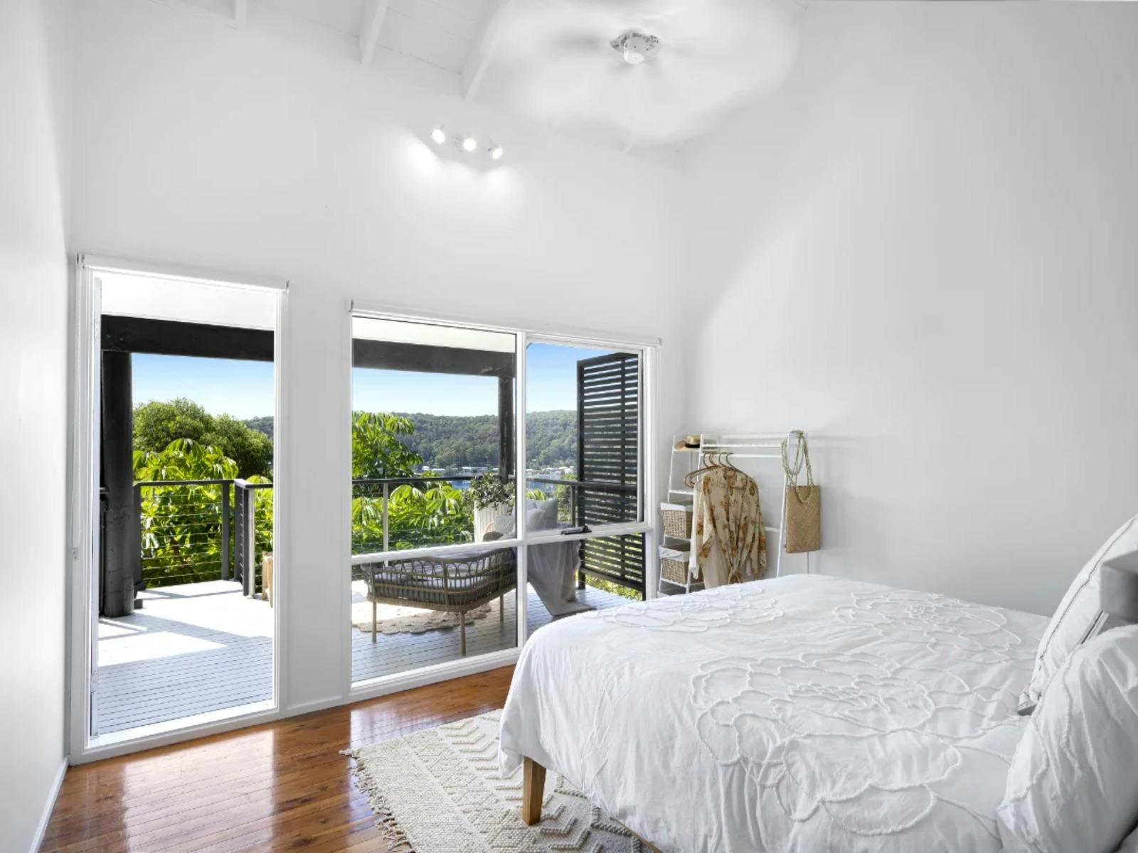 Light filled master bedroom with stunning views