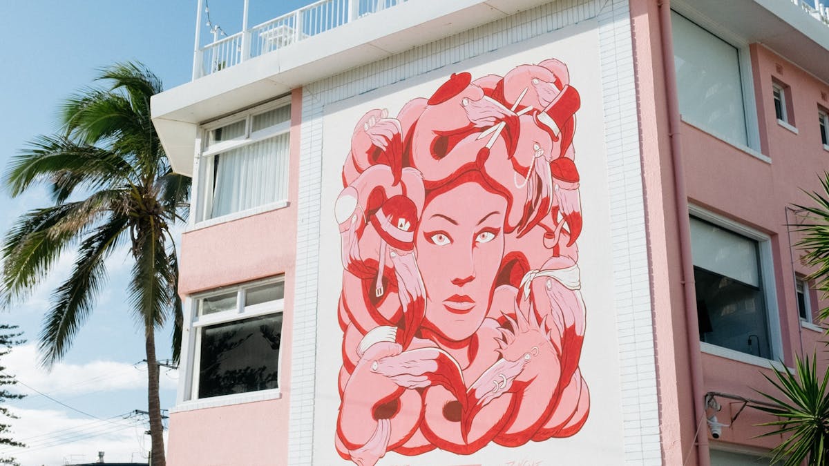 Pink Hotel mural by Poon Goat