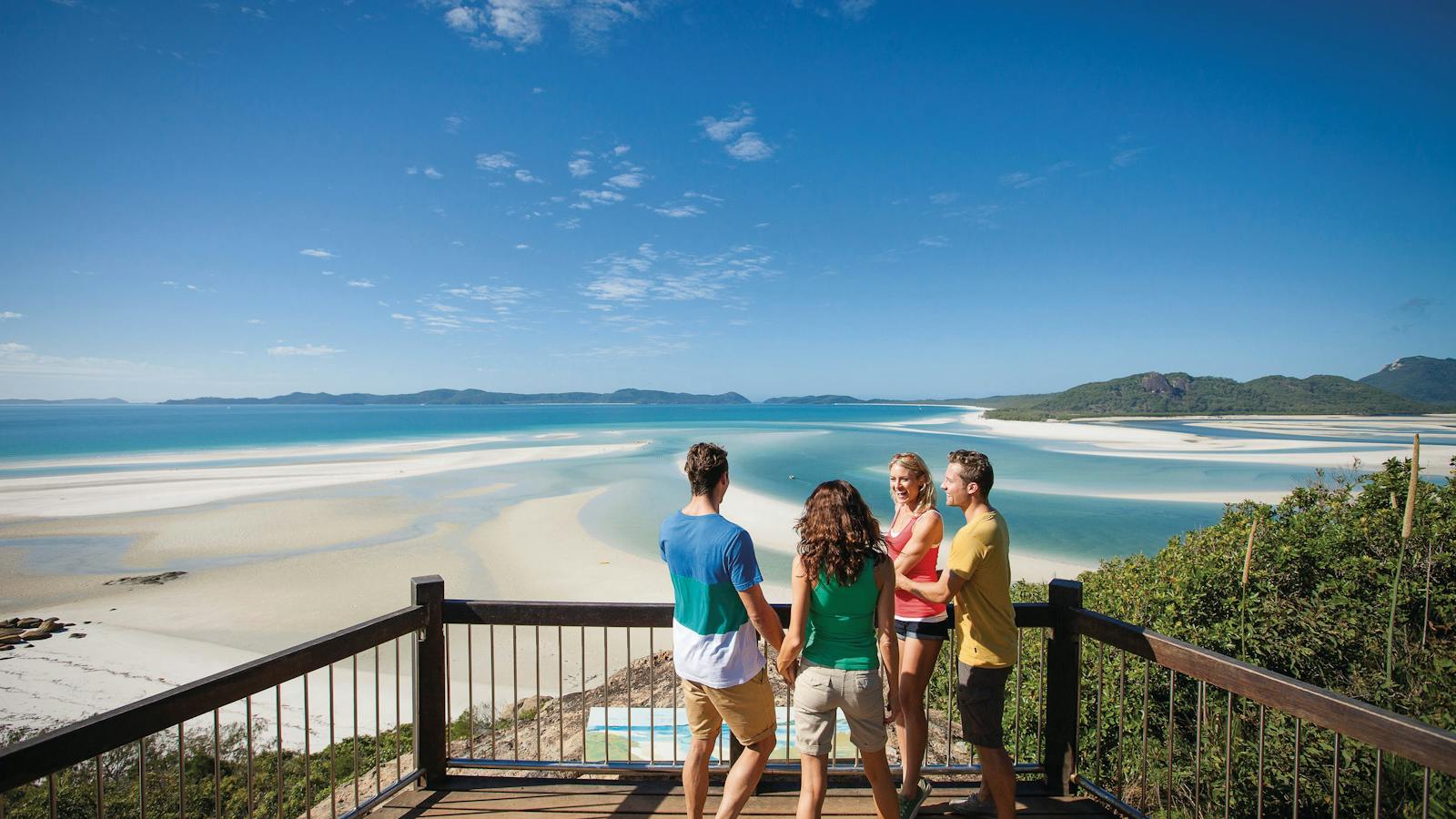 Two couple at lookout over Hill Inlet.