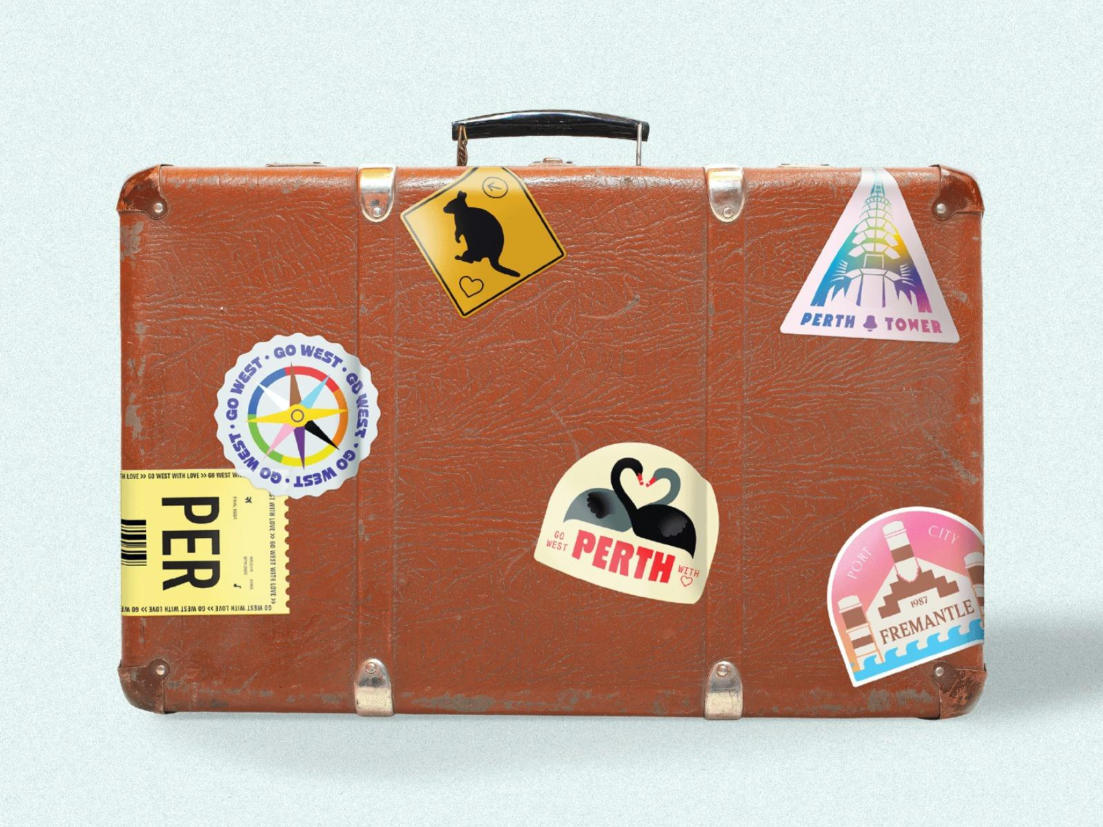 Brown suitcases with stickers