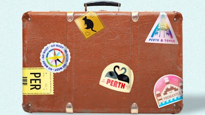 Brown suitcases with stickers