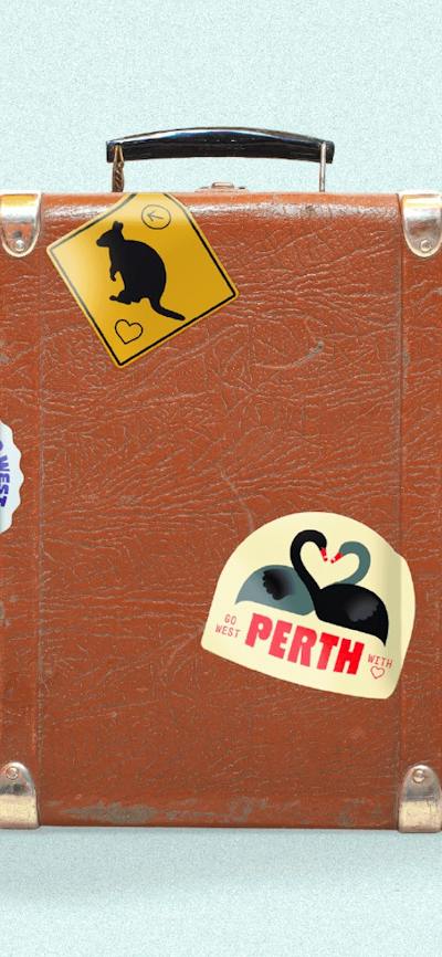 Brown suitcases with stickers