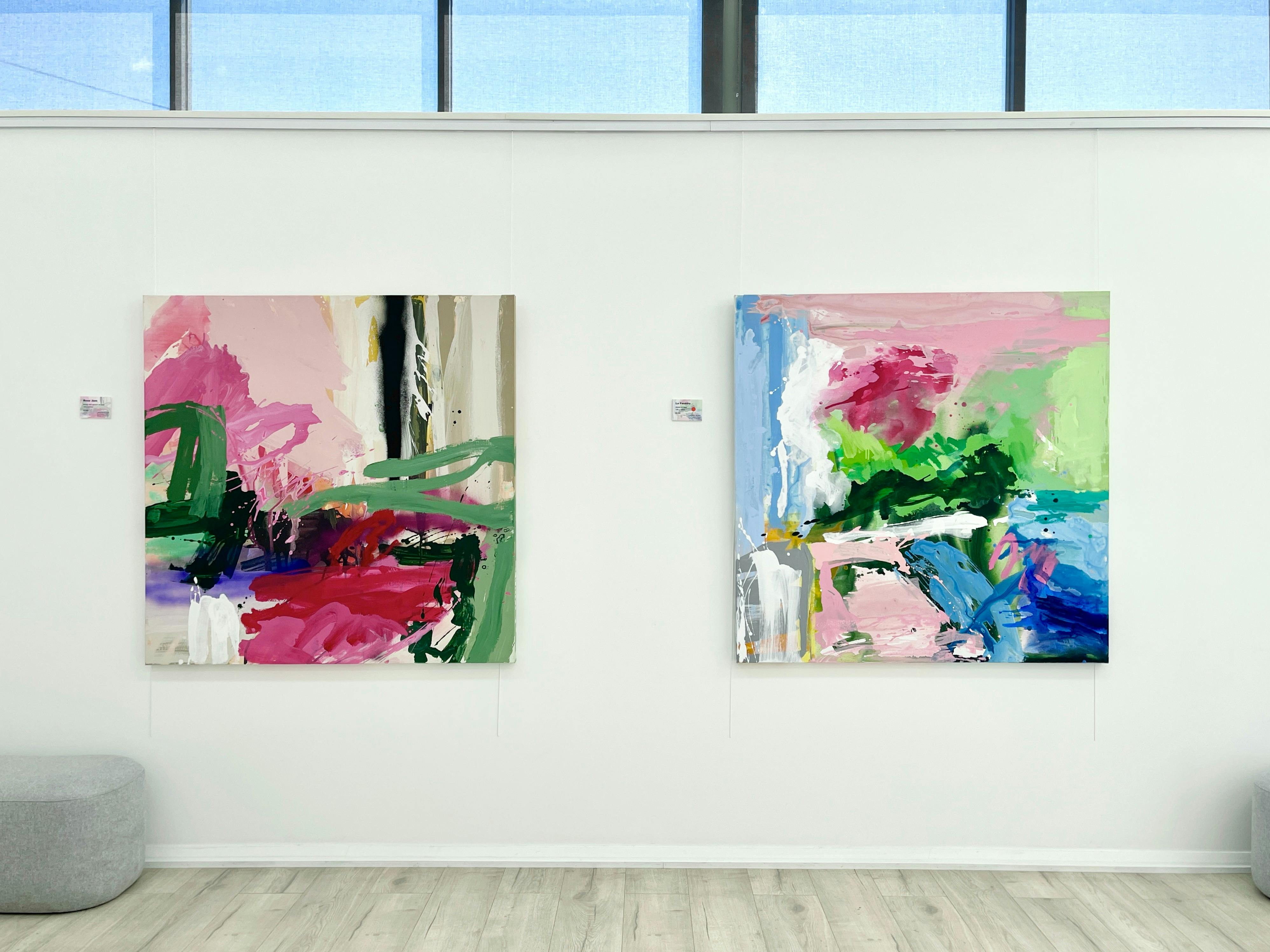 Two large artworks hanging by colourist artist Larissa Blake