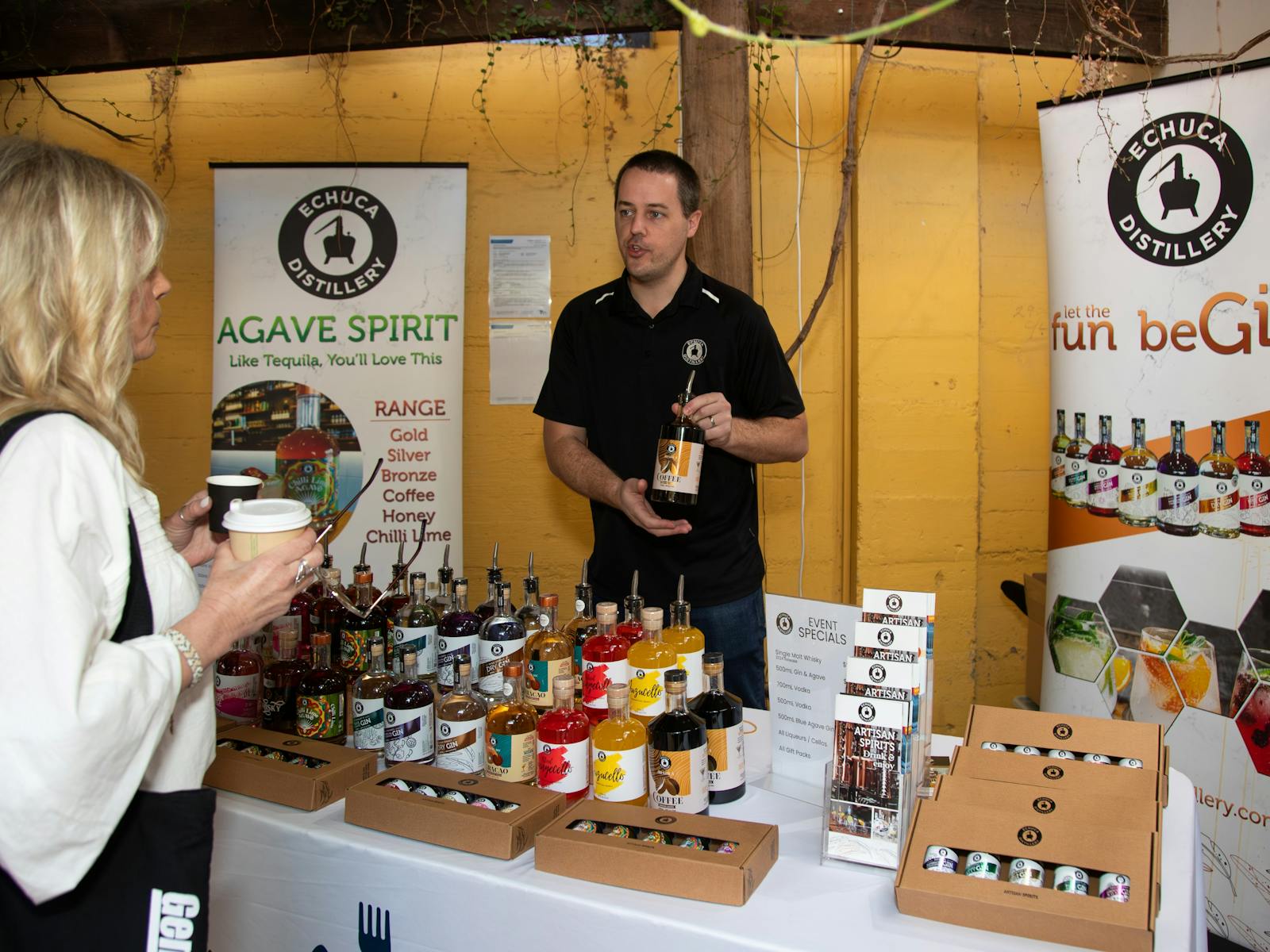 Echuca distillery market stall showcasing a wide range of spirits