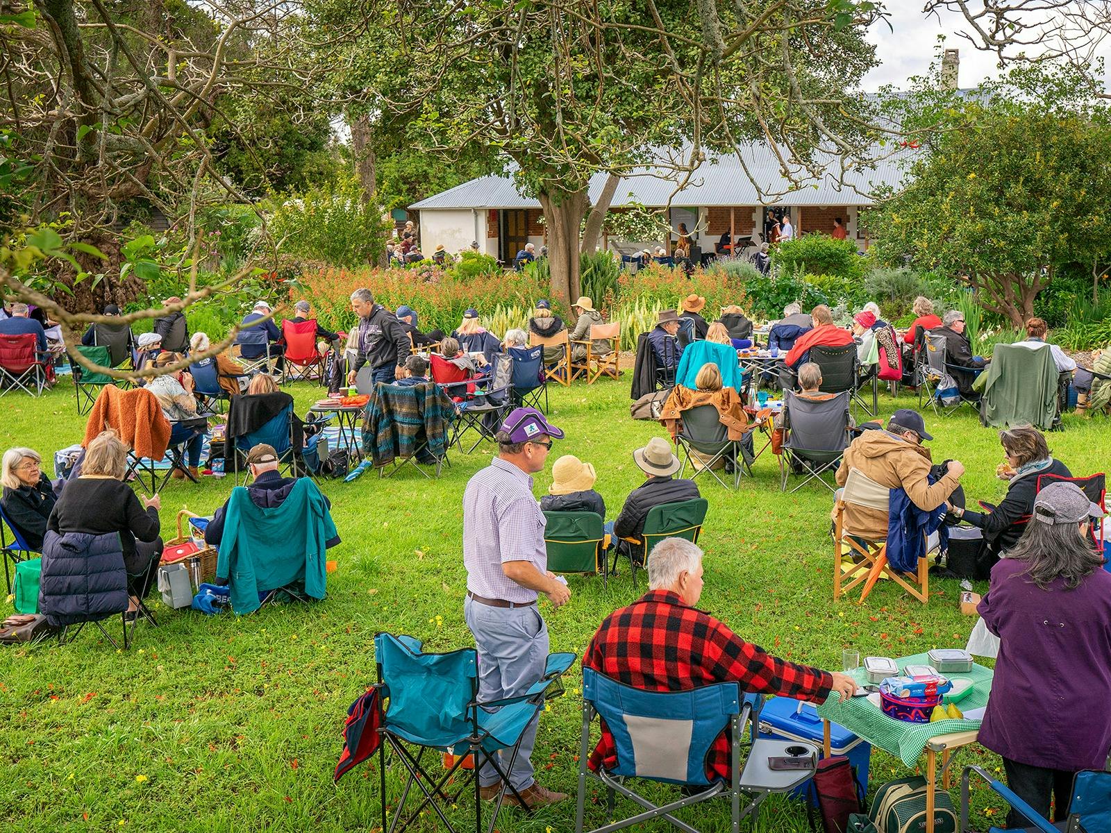 People picnicking on the lawn