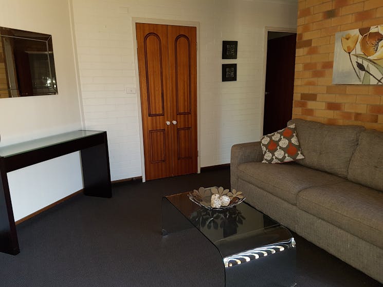 Apartment living room with lounge and coffee table