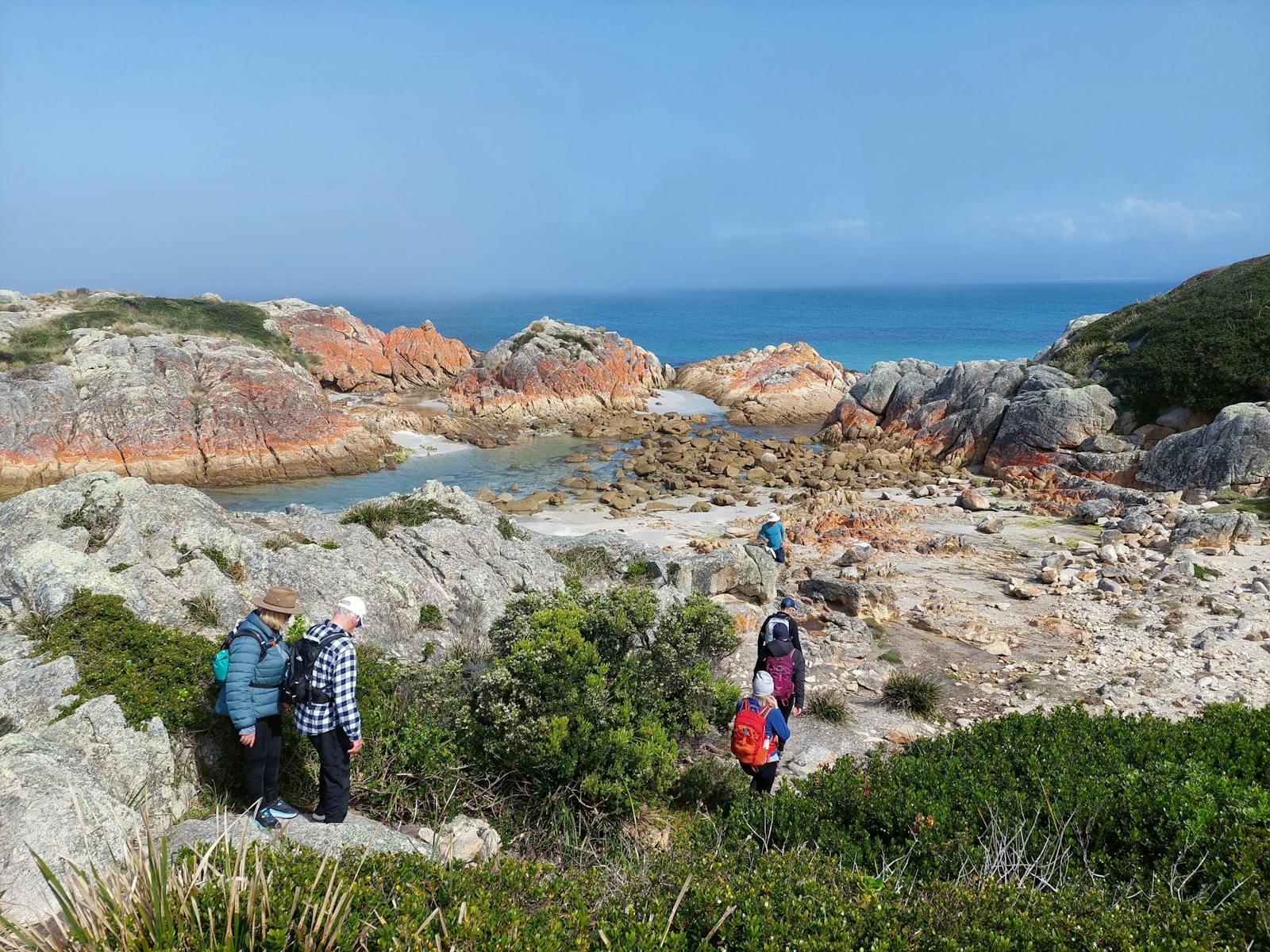 Tour Guests Walking Exploring Rockpool Point Park Trek Walking Holidays Bay of Fires Hiking Tour