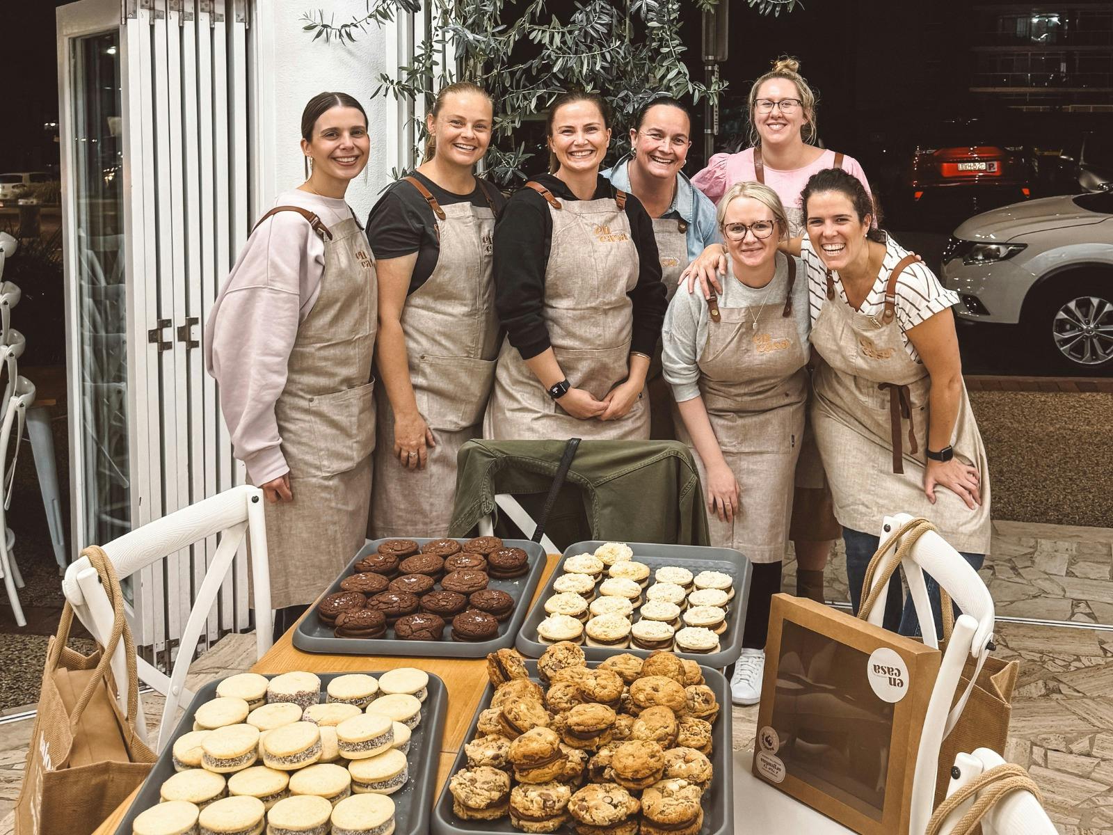 group of hobby bakers at an alfajores baking workshop