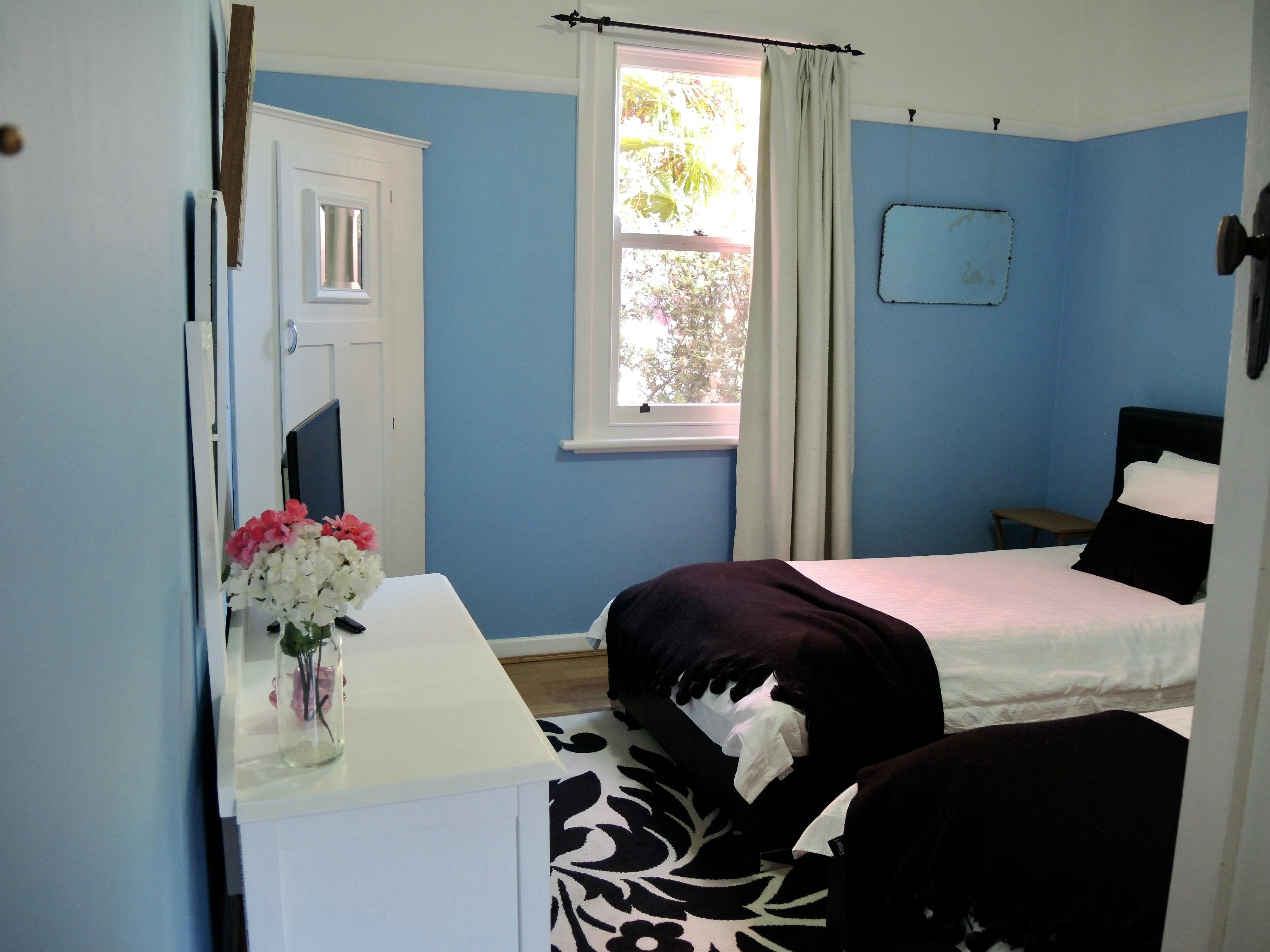 2 single beds electric heat and ceiling fan