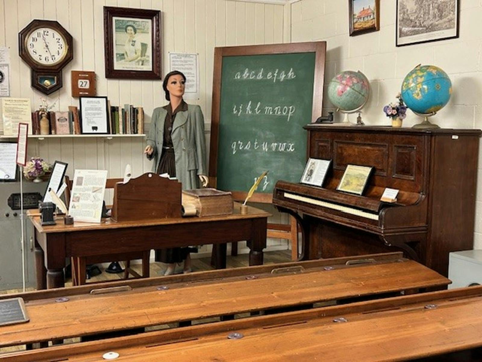 Display of old-fashioned school room.