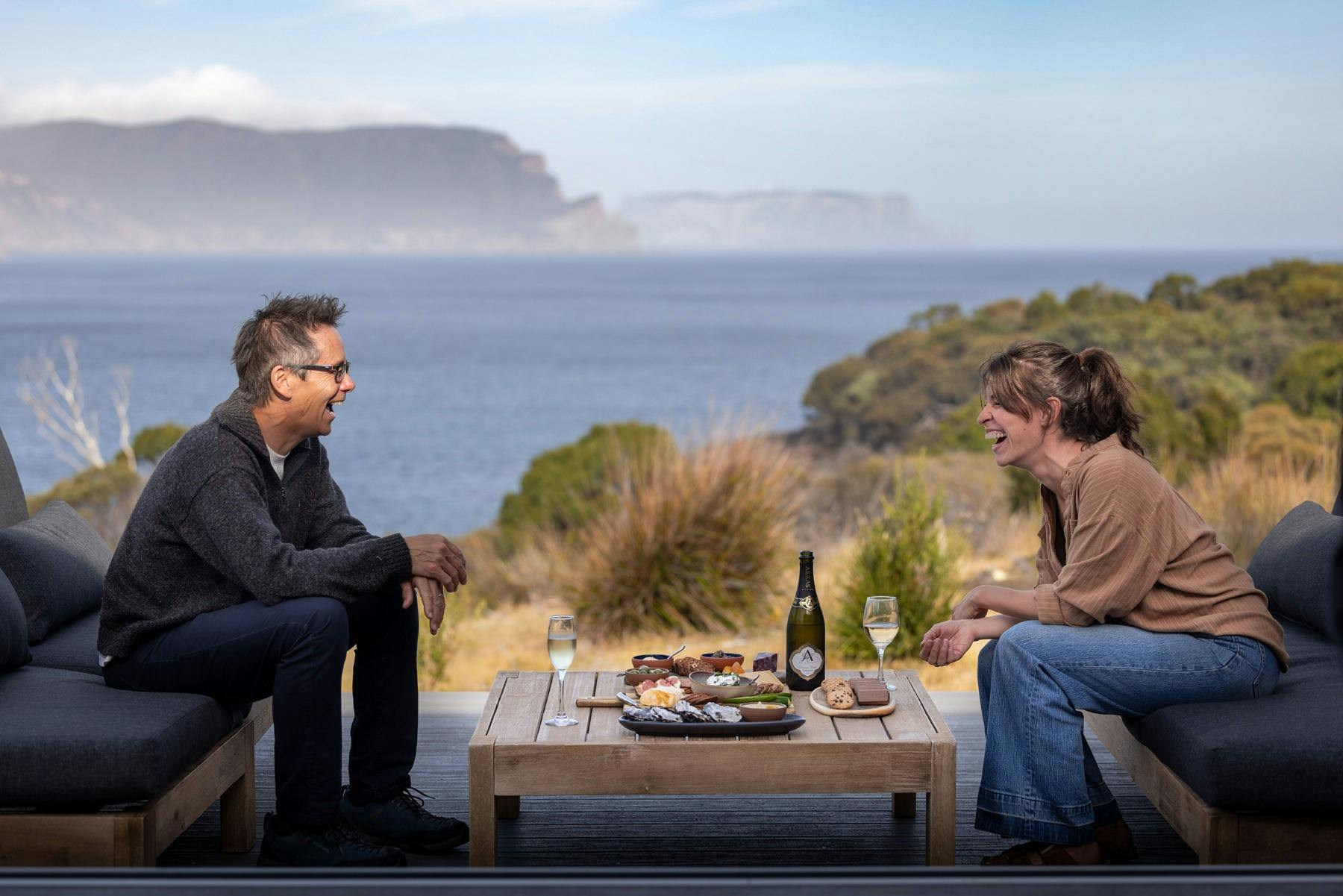 Food and wine on the deck overlooking Cape Pillar