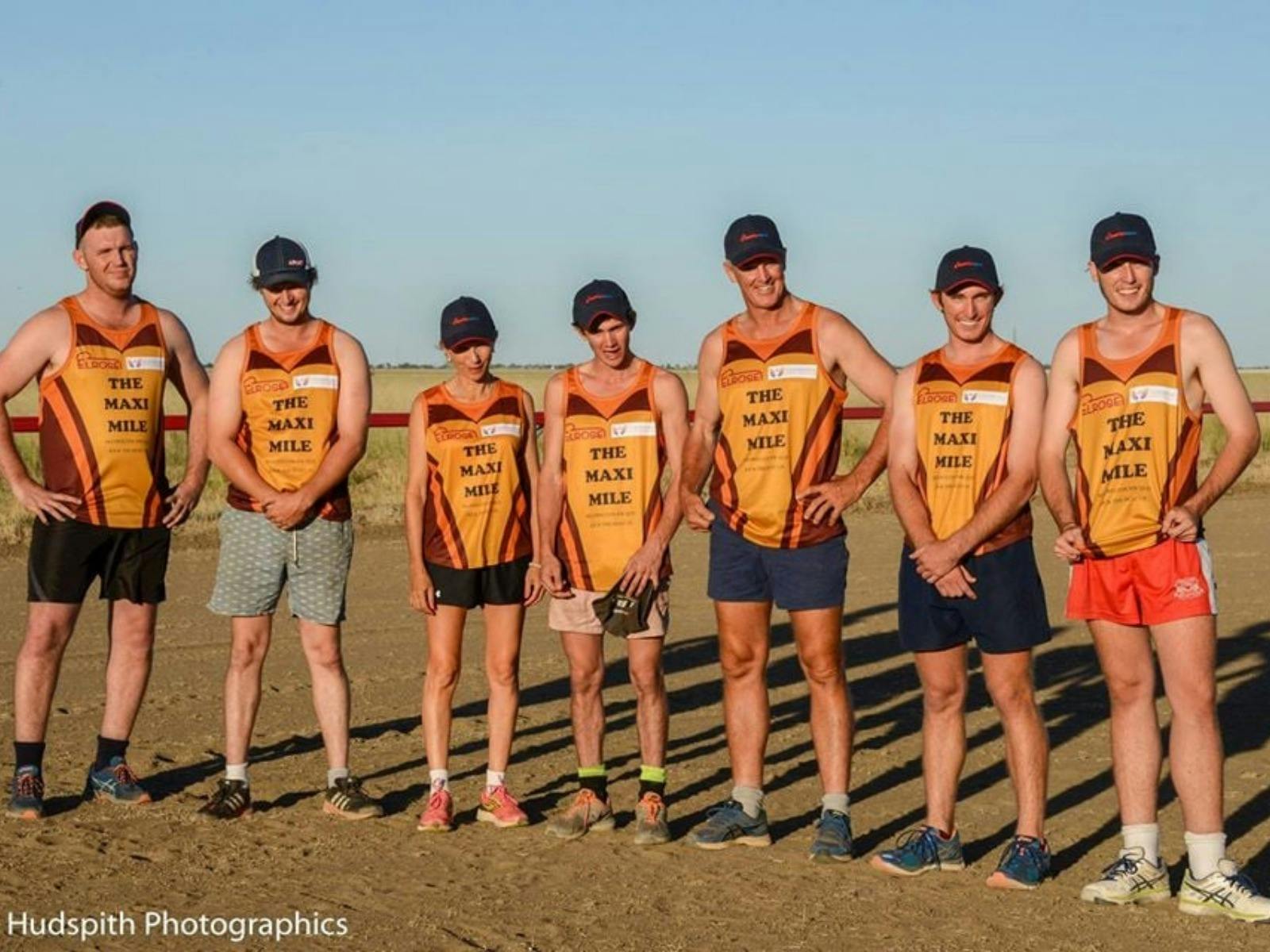 Men line up for Maxi Mile foot race