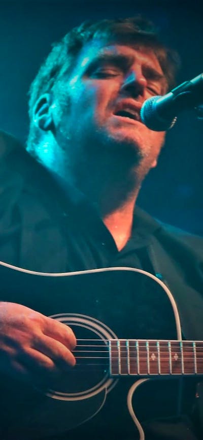 Alex playing guitar