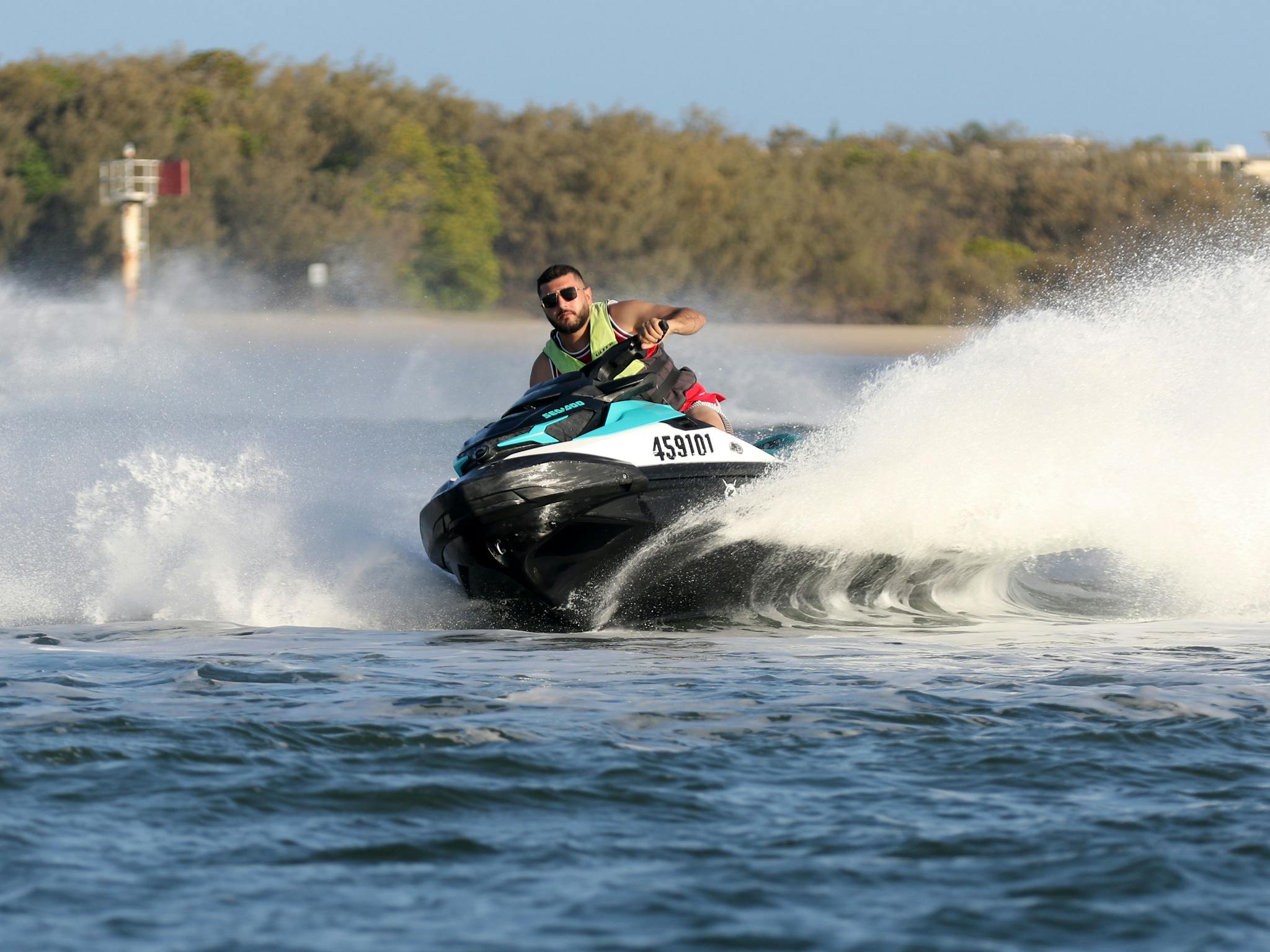 Man tearing it up on jet ski Man tearing it up on jet ski