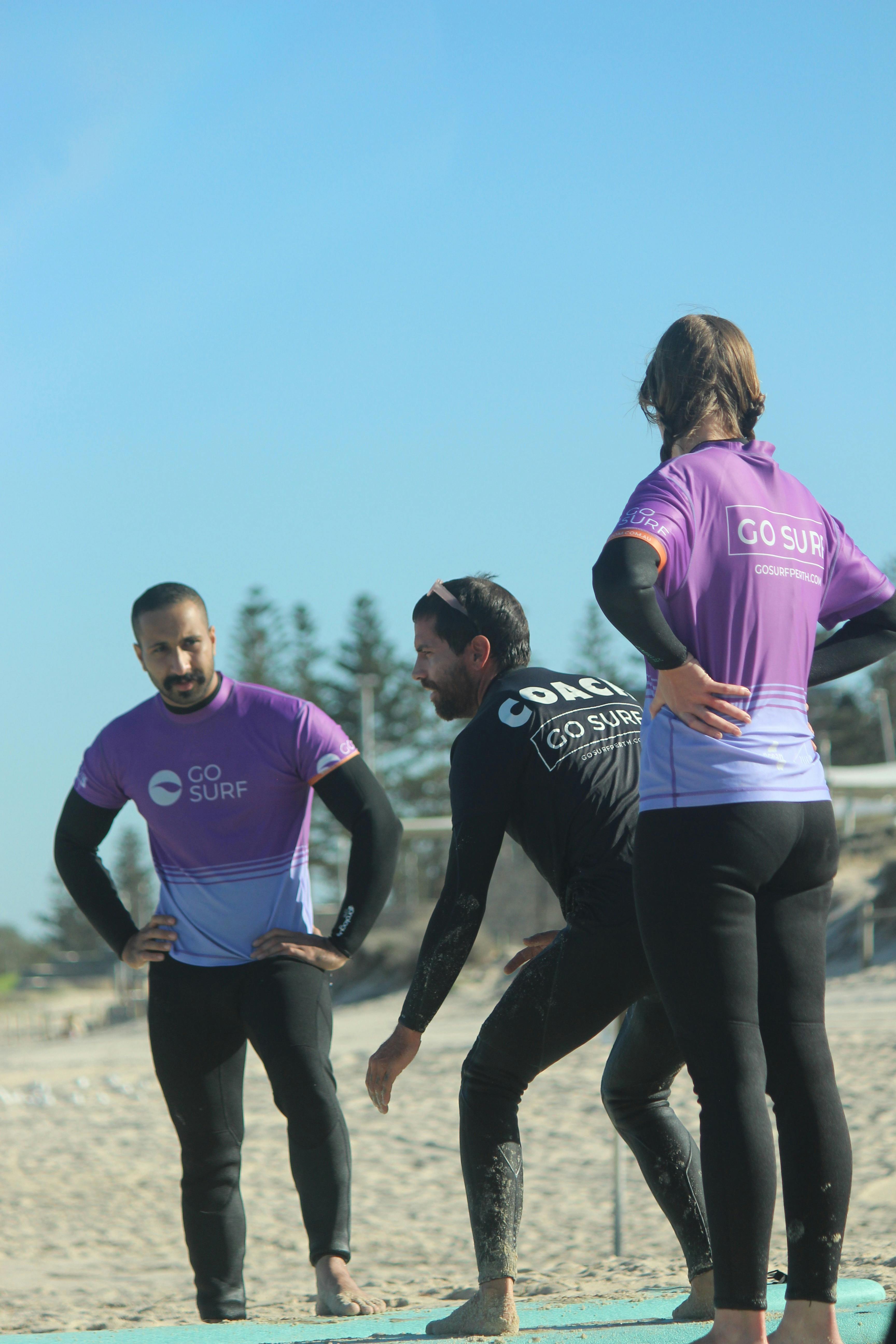 Diving into the finer points of surfing with our expert instructor! 🏄‍♂️💡