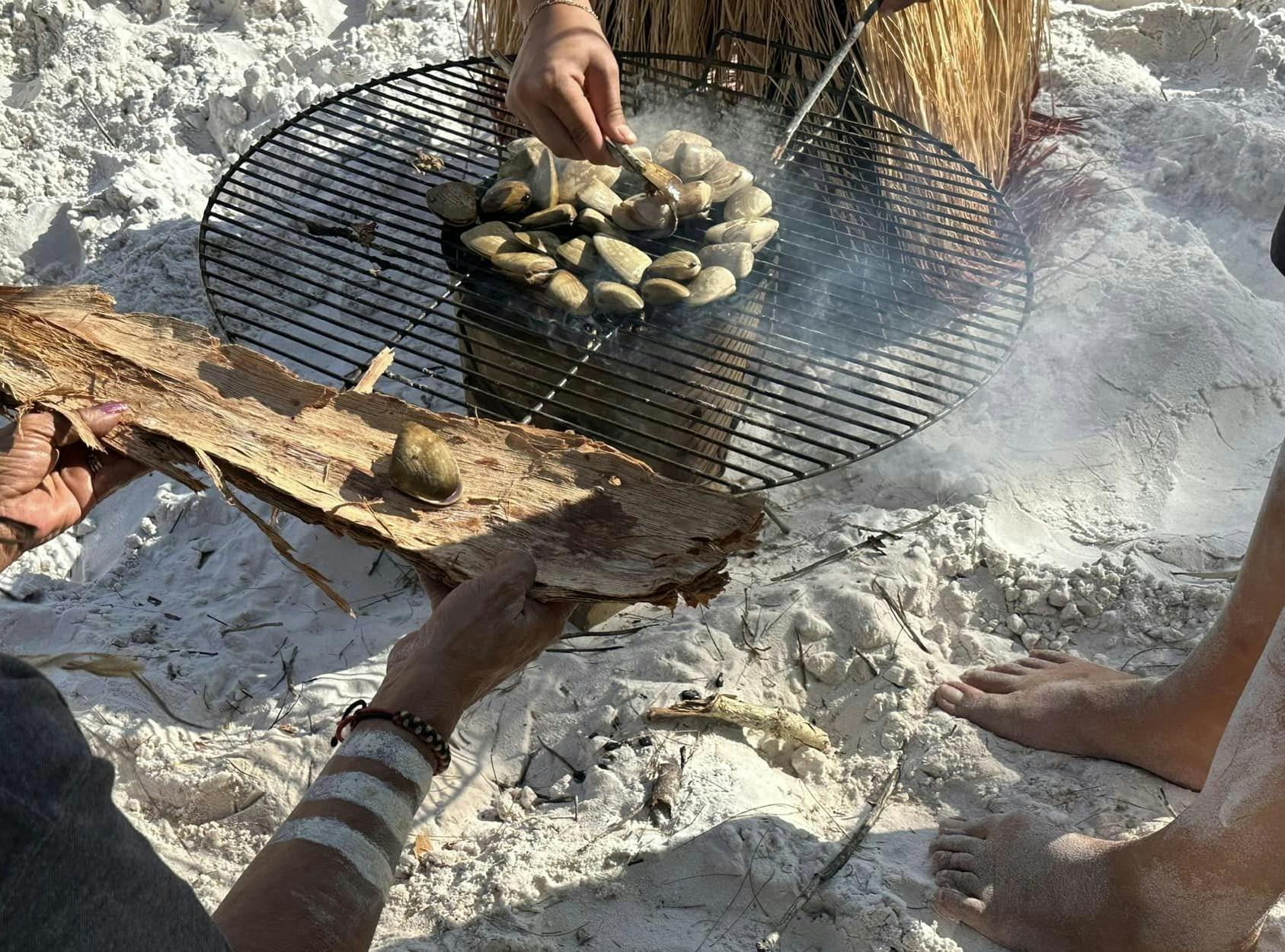 cooking up wongs (pippies) on the beach