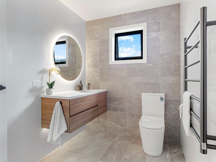 main bathroom - heated floors - modern vanity - shower