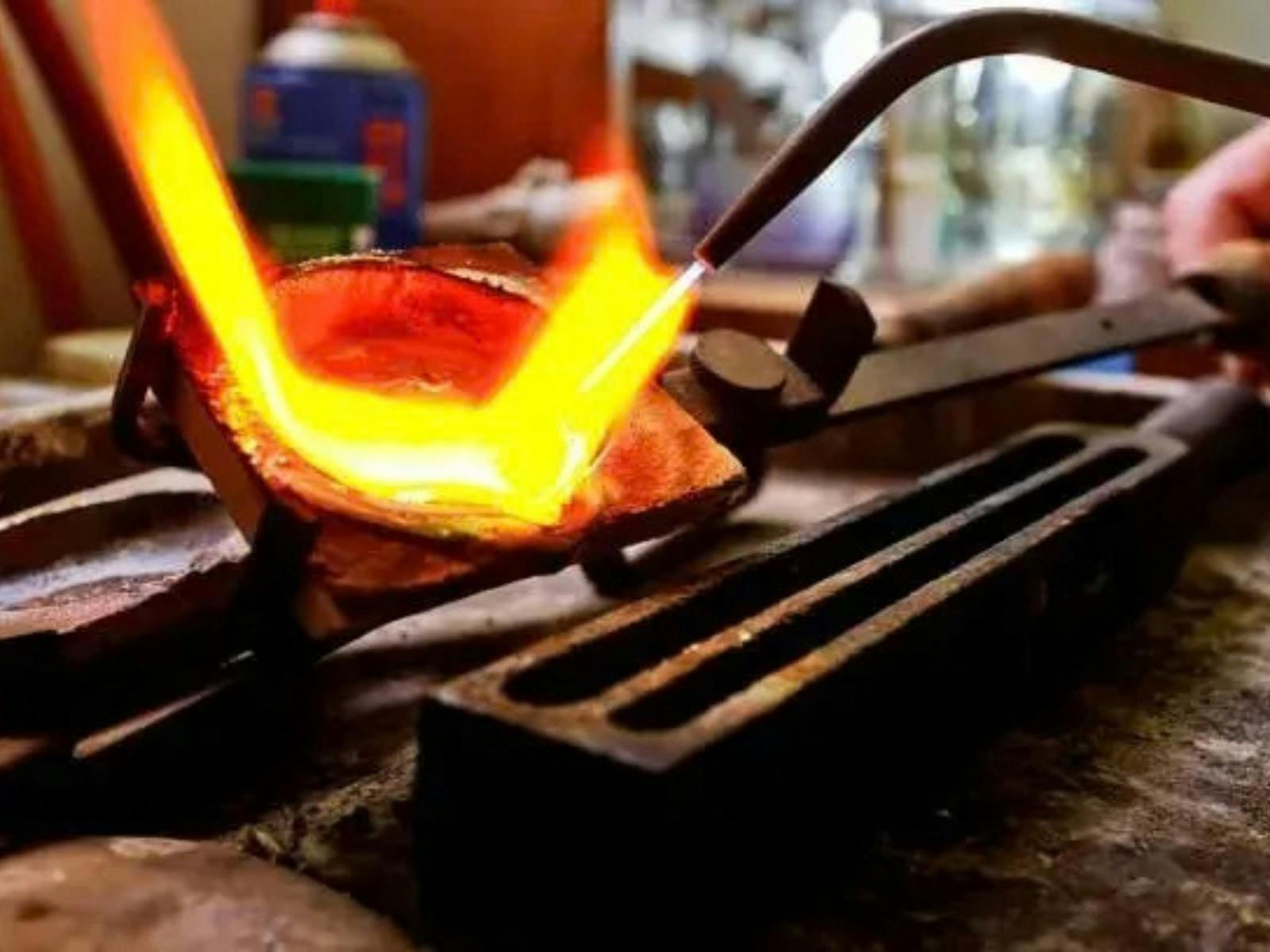 Metal heating over a flame