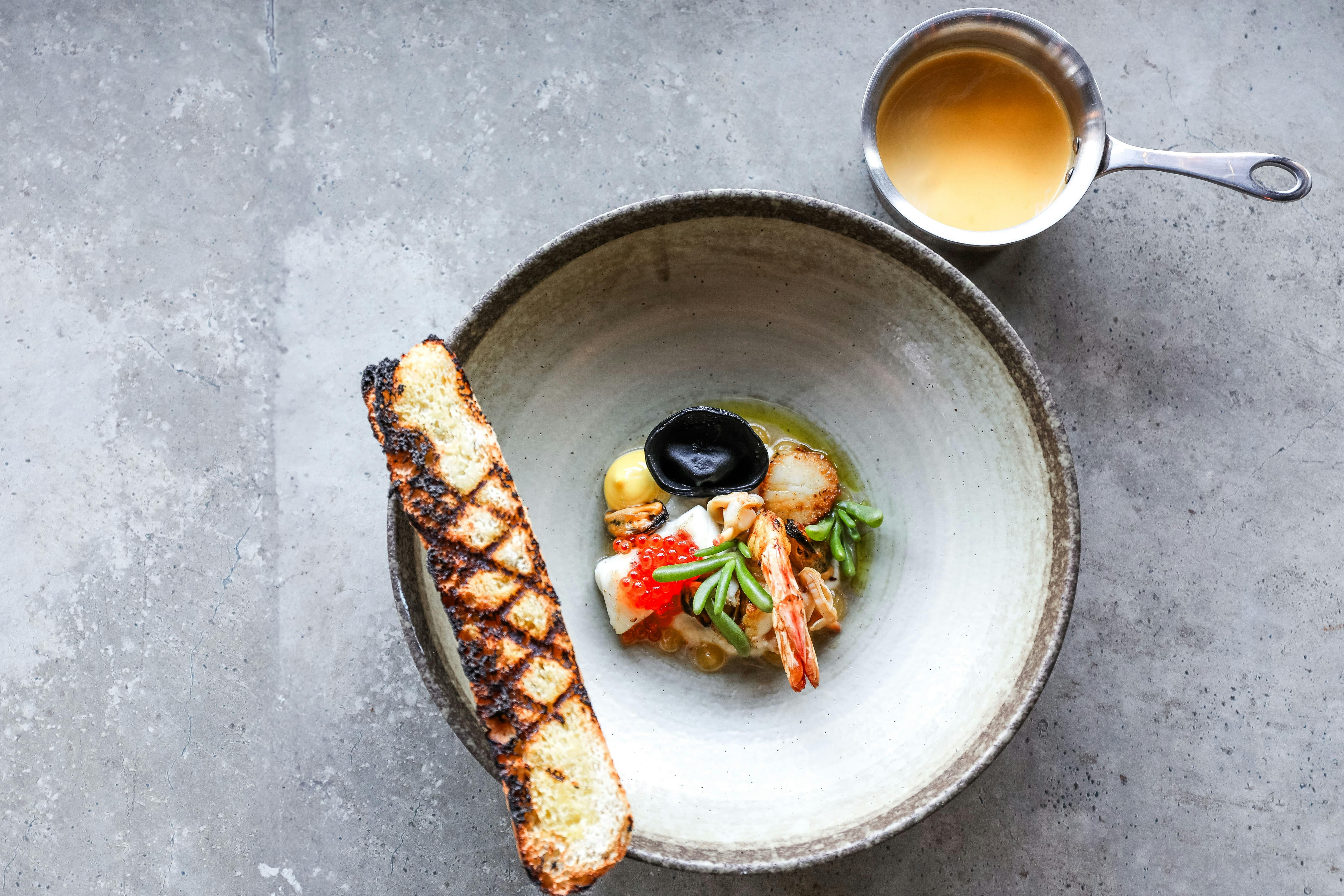 Our divine seafood bouillabaisse from our Spring 2024 menu