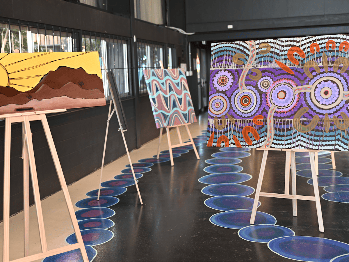 exhibition setup with art