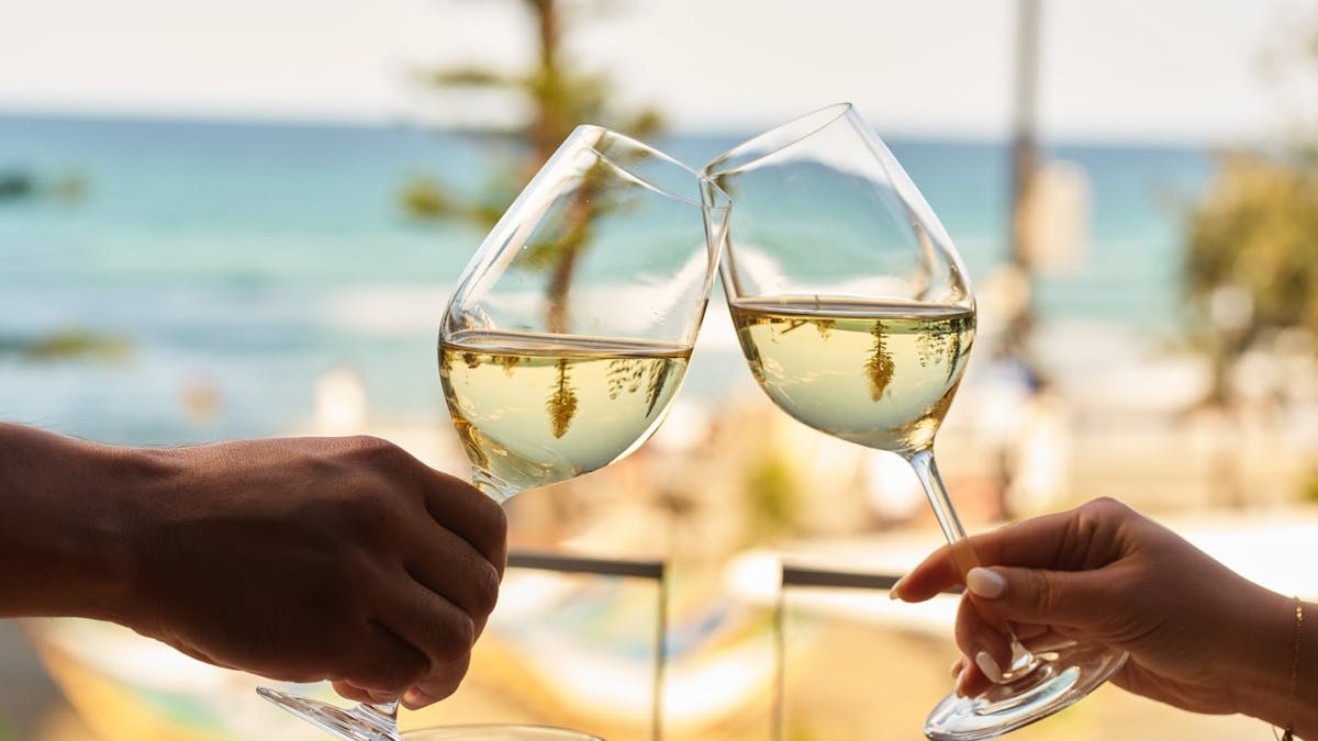 Hurricane's Surfers Paradise - Two Glasses of White Wines With A Beach View