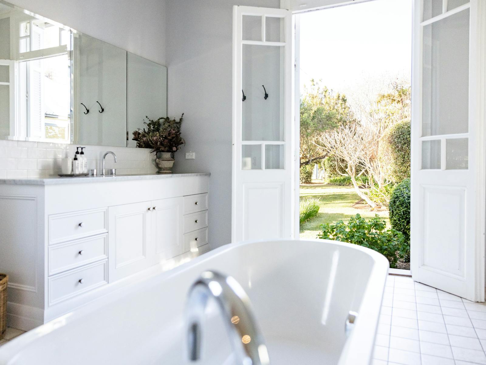 Imagine soaking in a luxurious bath looking out to the gardens