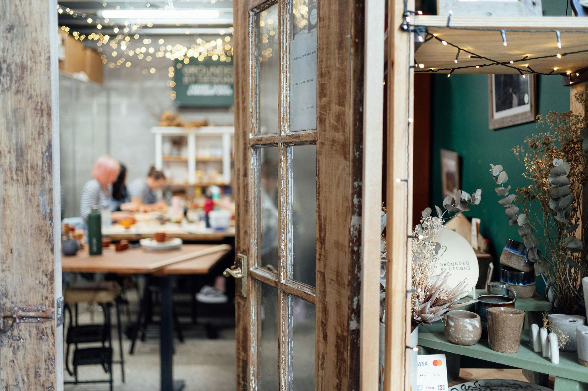 studio open door with people working inside