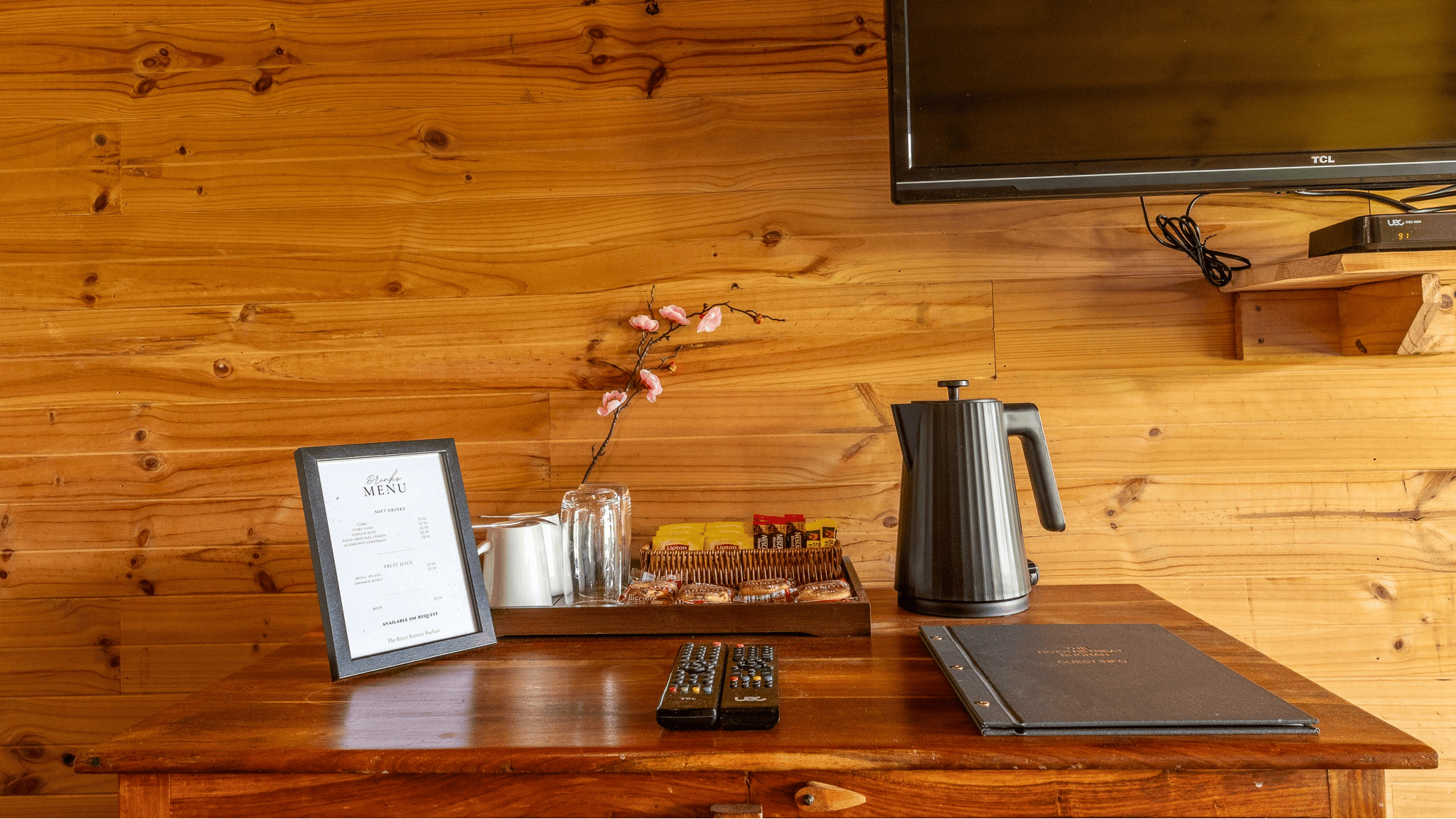 Complimentary Tea and Coffee on wooden desk
