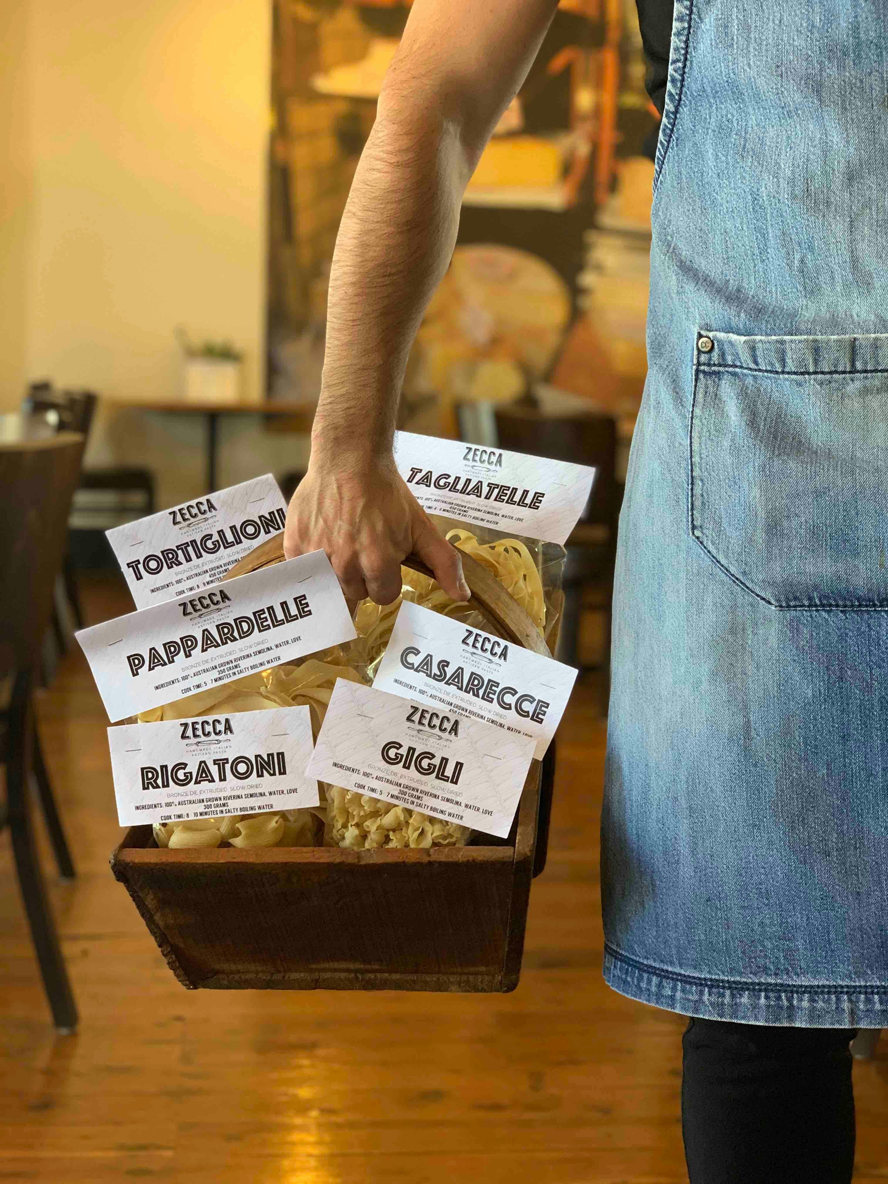 ZECCA HANDMADE ITALIAN DRIED ARTISAN PASTA IN A WOODEN BASKET