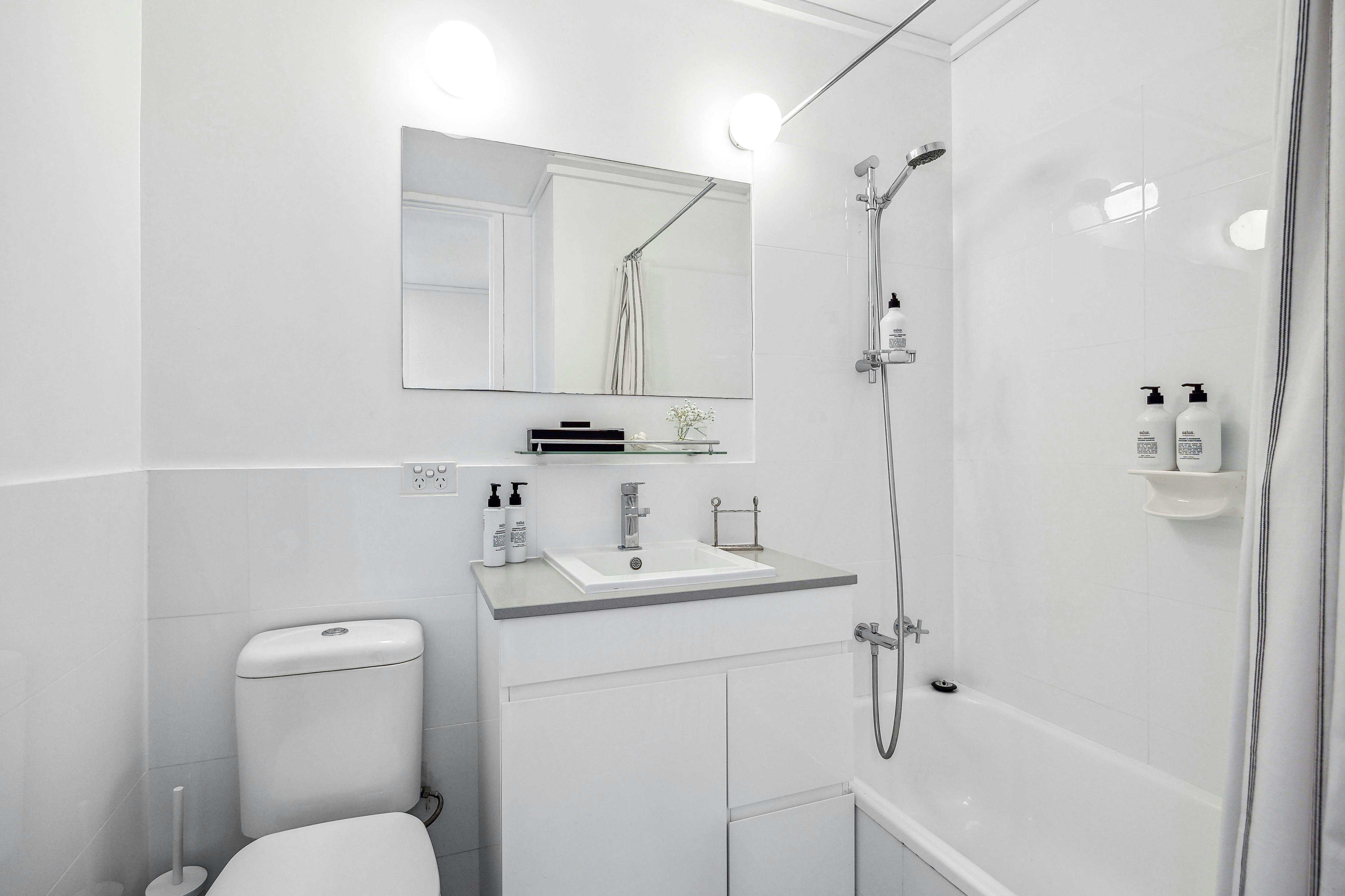 Bathroom one with shower, bath, toilet and basin