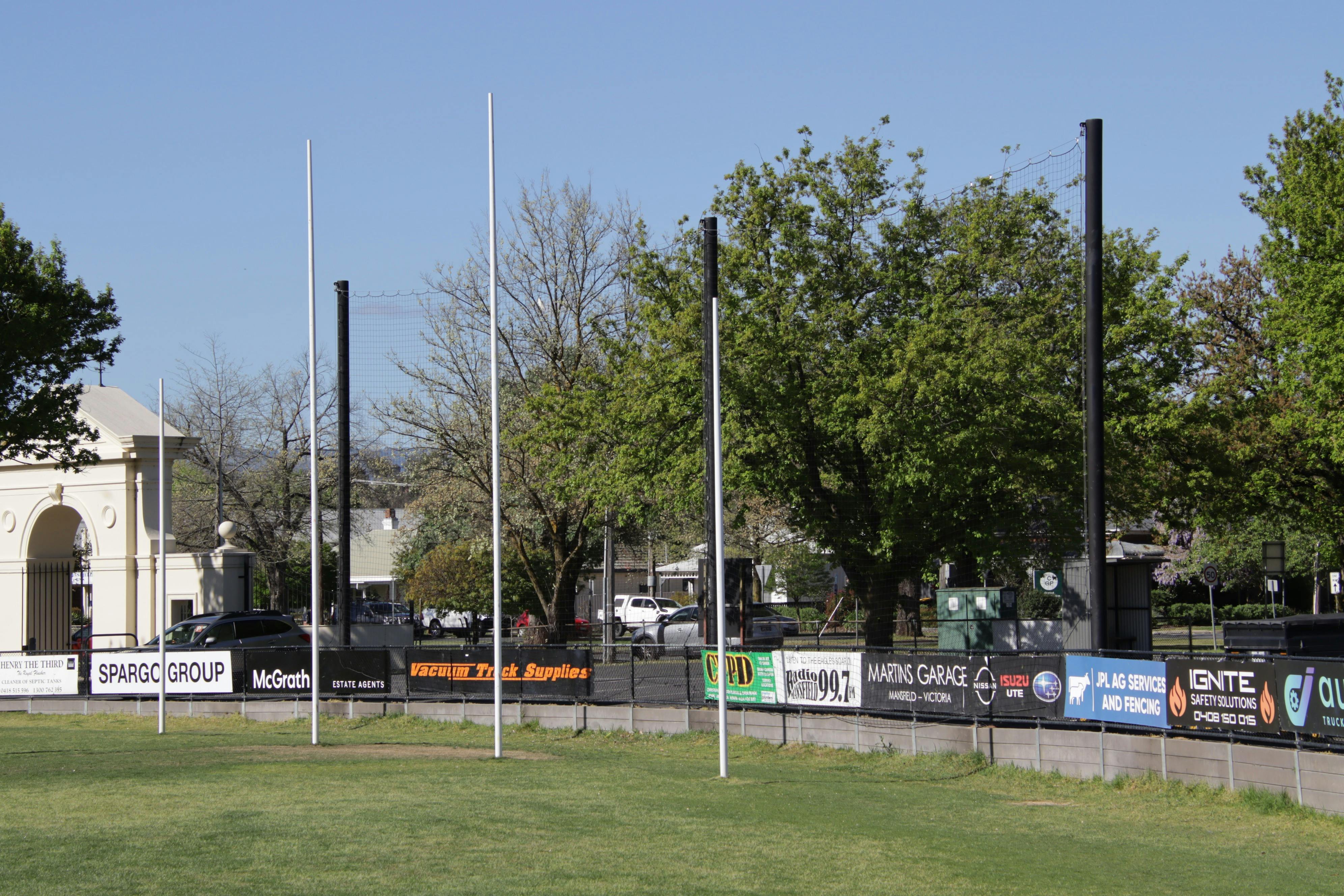 Goal posts at skate park end of field