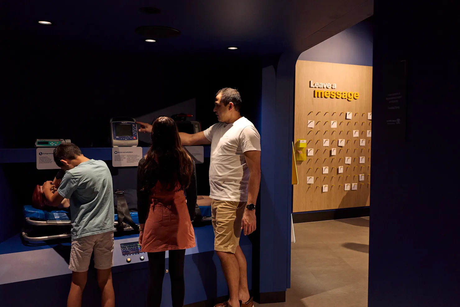 Family exploring interactive visitor centre
