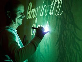 Jimmi Buscombe's Interactive Glow in the Dark Mural Cover Image