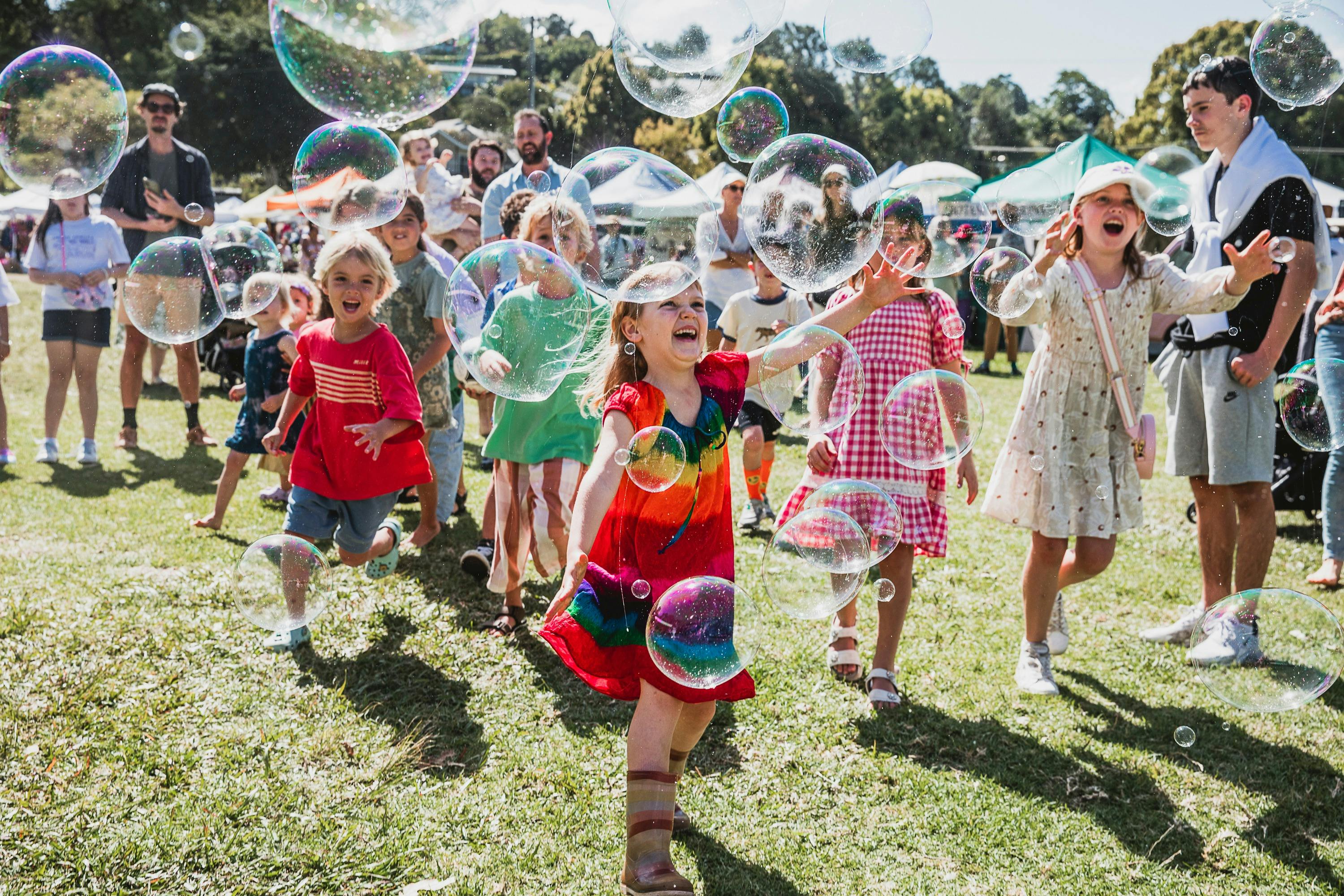 Sample Food Festival kids roaming entertainment including bubbles
