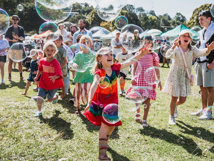 Sample Food Festival kids roaming entertainment including bubbles