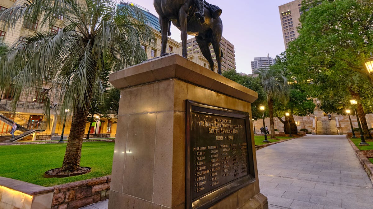 Mounted statue of a soldier on horseback in a city square