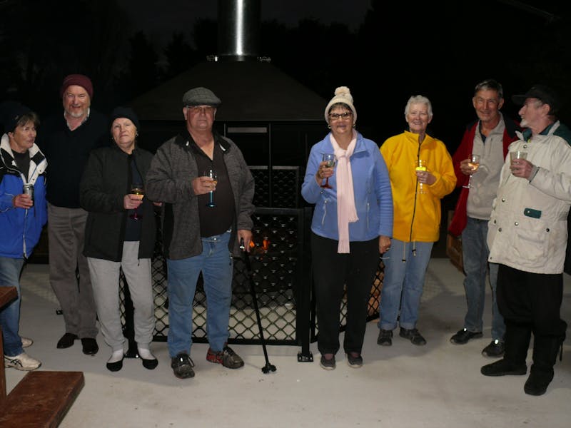 Guests in front of firepit