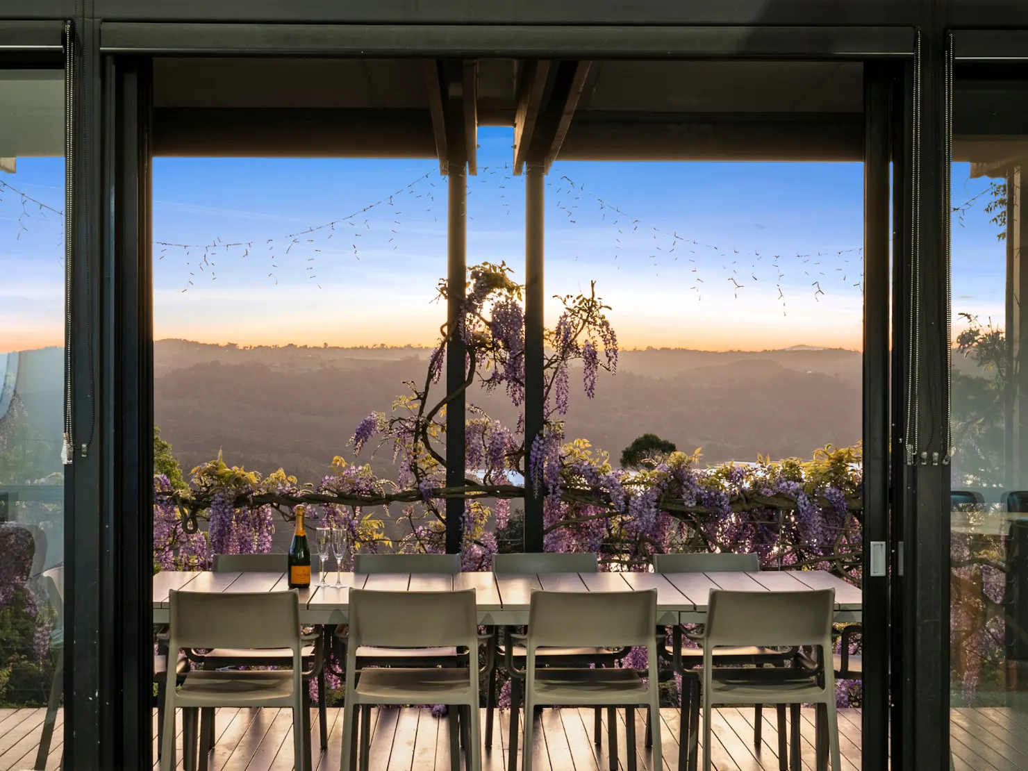 Outdoor dining on balcony with sweeping views