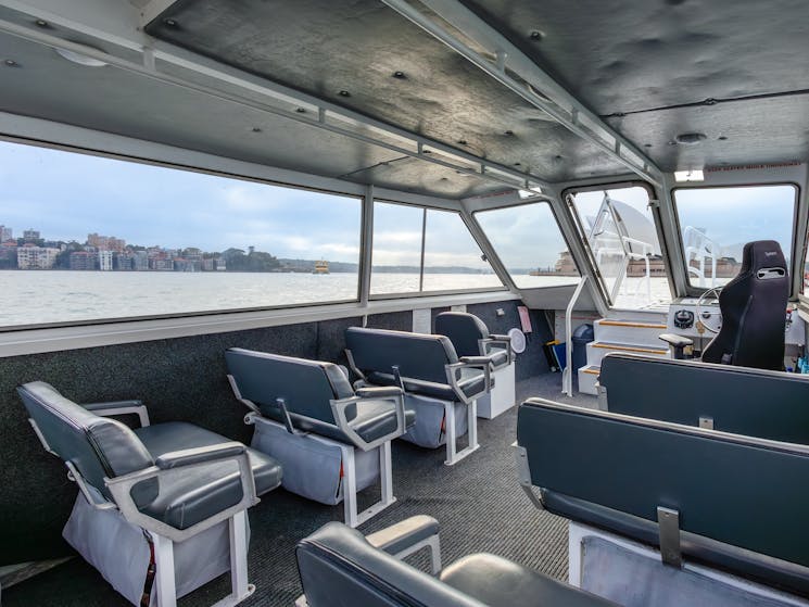 Unwind and relax with private seating aboard a White Water Taxi tour of Sydney Harbour.