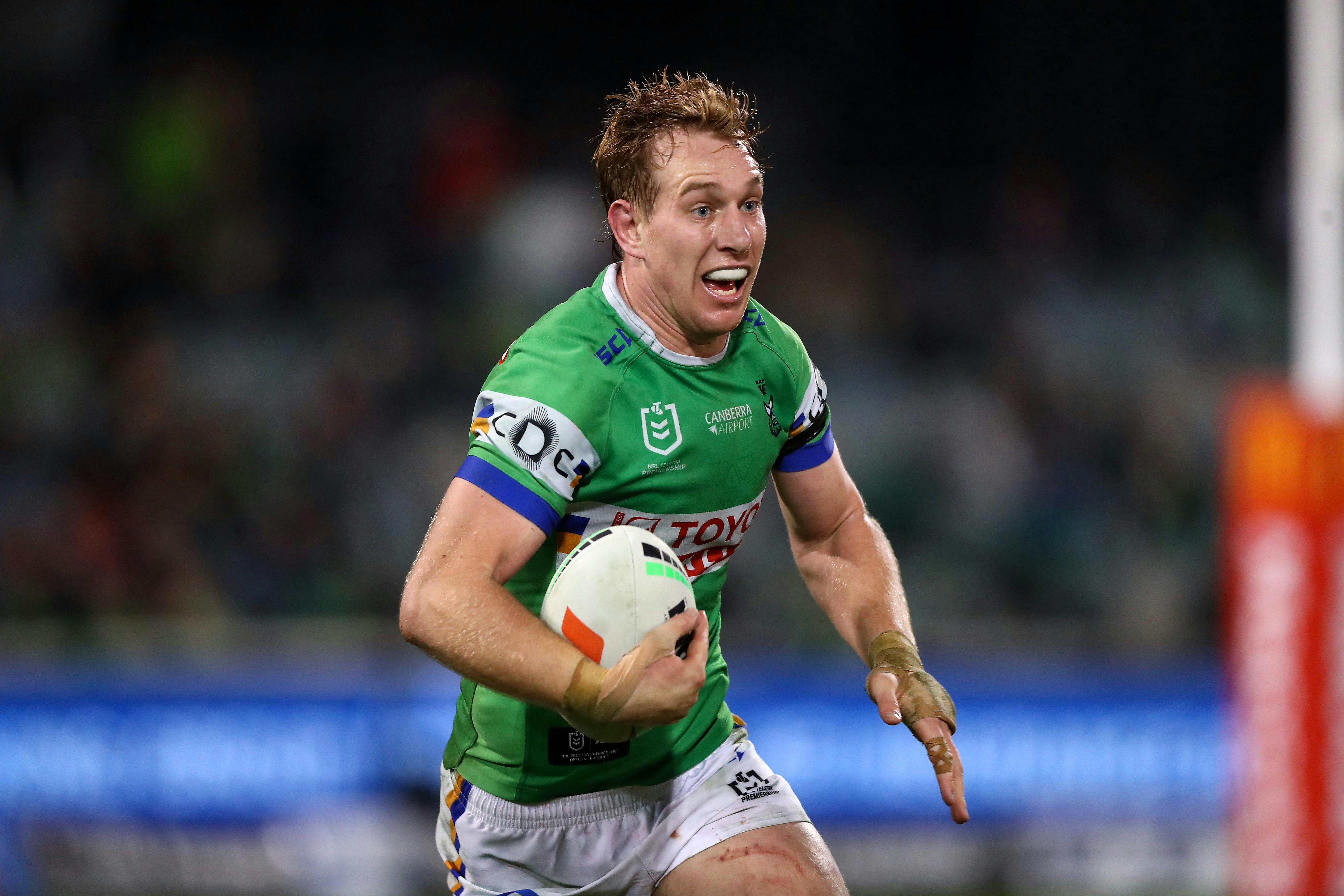 Canberra Raiders player Zac Hosking running the ball.