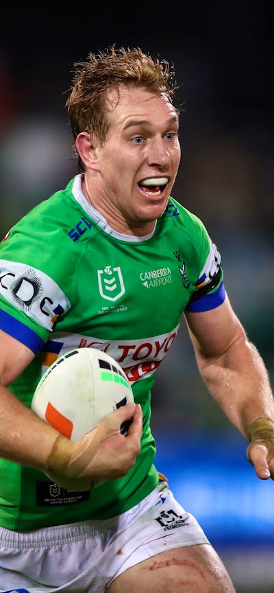 Canberra Raiders player Zac Hosking running the ball.
