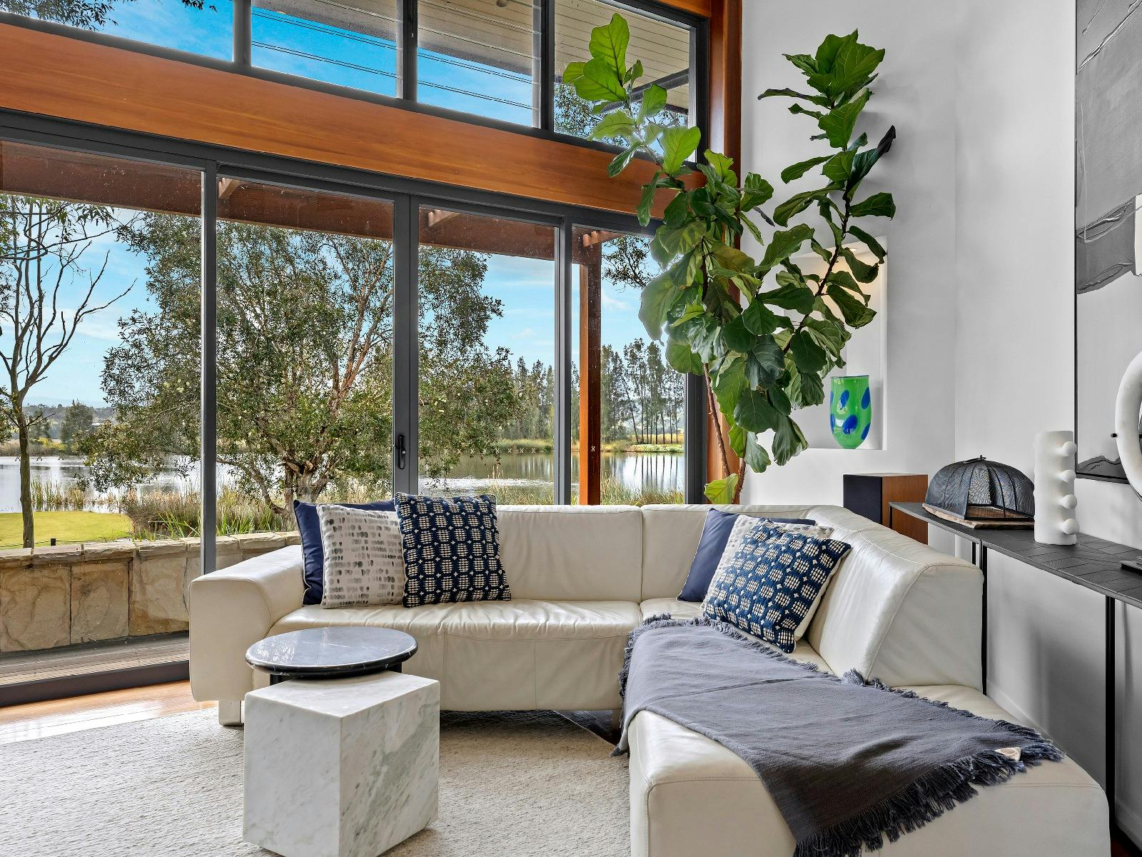 Hunter Villa second loungeroom and entertainment area overlooking the lake and 12th tee