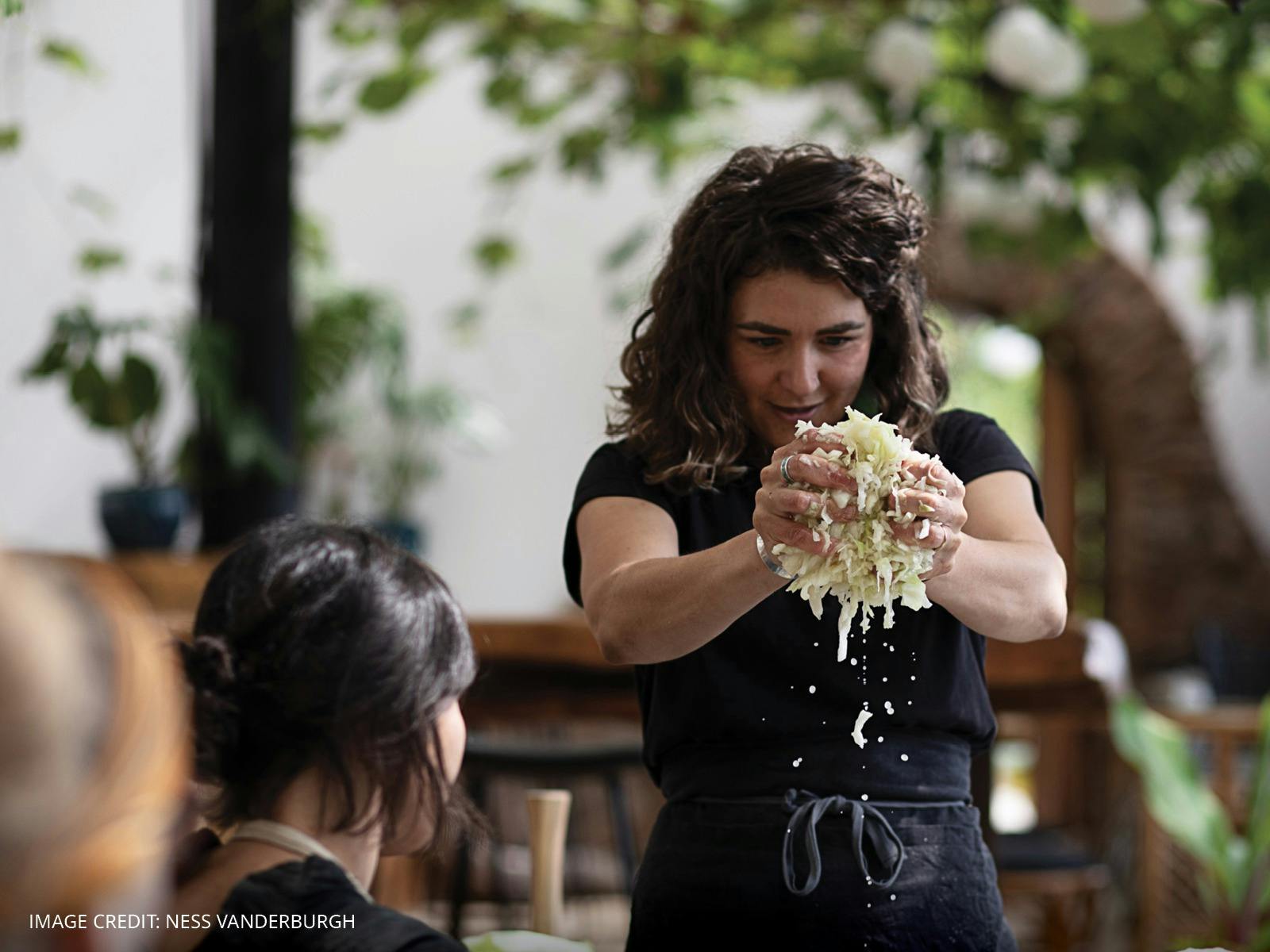 An image of a person at a hands-on workshop