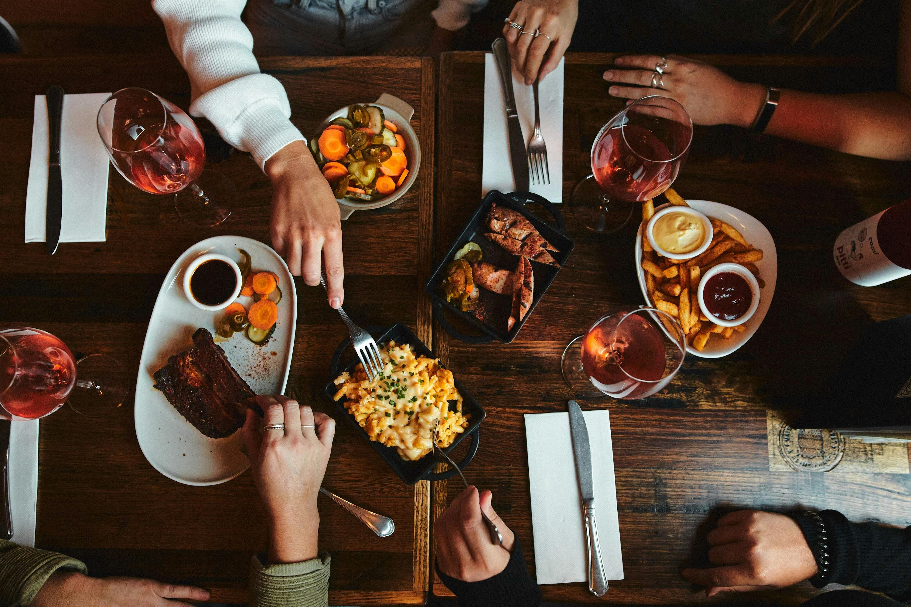 American style barbeque dishes placed on a wooden table