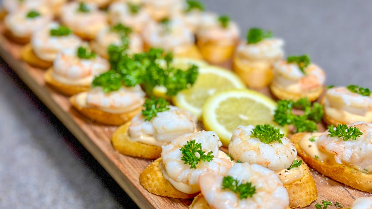 image of canapes platter with prawn crostinis