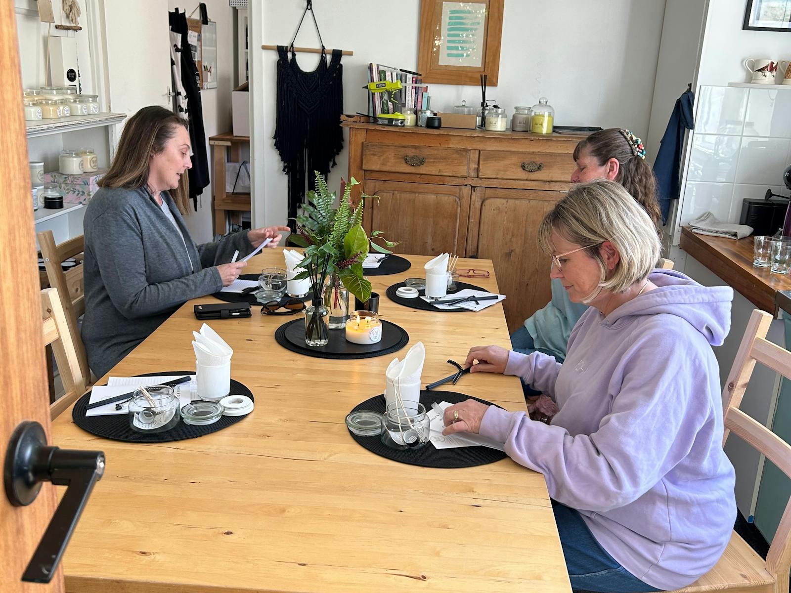 Initial stage of workshop learning the theory of candle making, including safety aspects