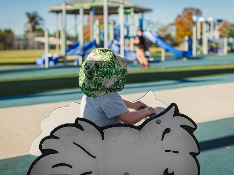 Young child playing at Telopea Park