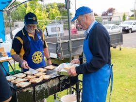 Lions club members cooking