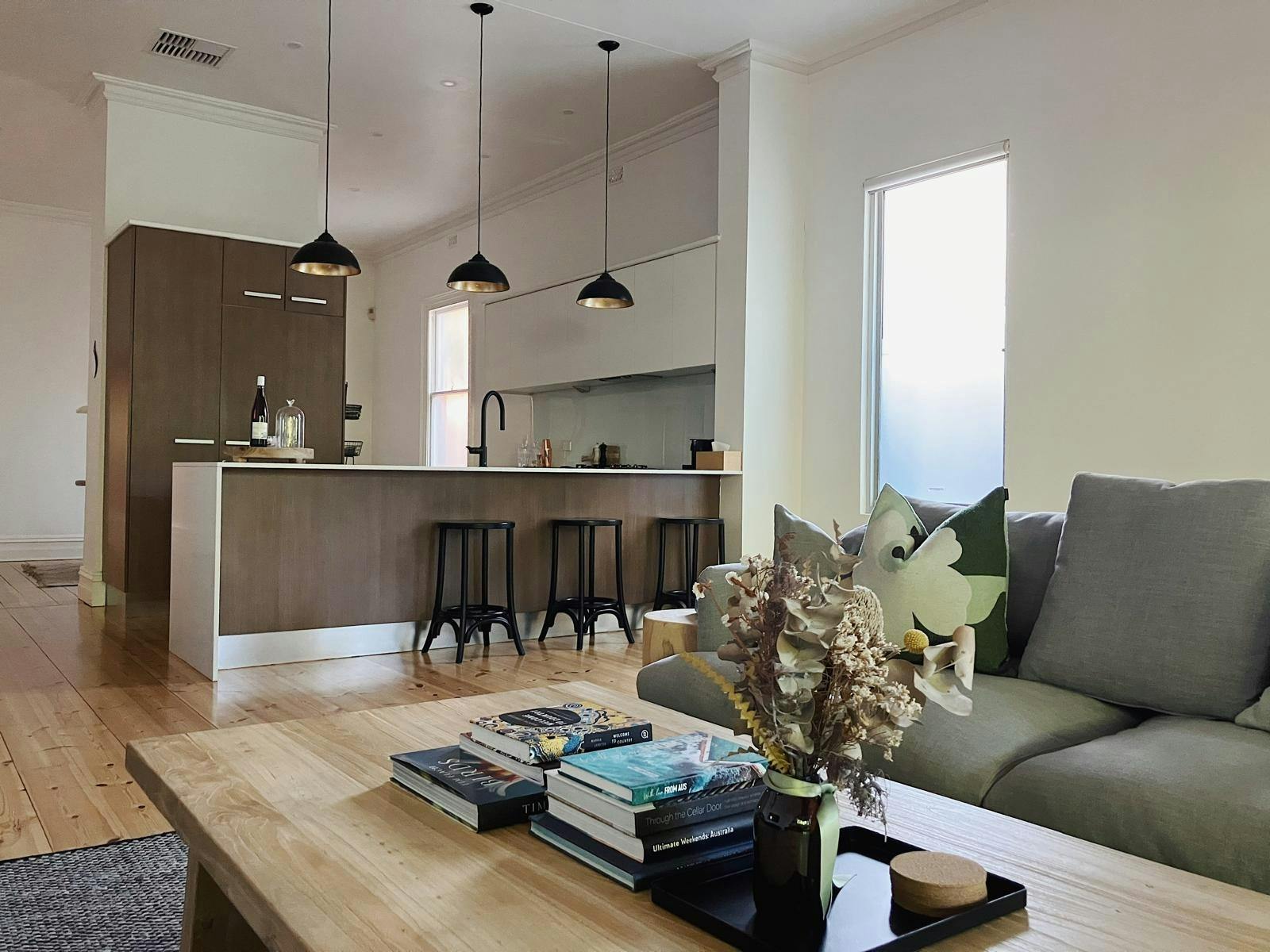 Generous lounge and kitchen with impressive high ceilings